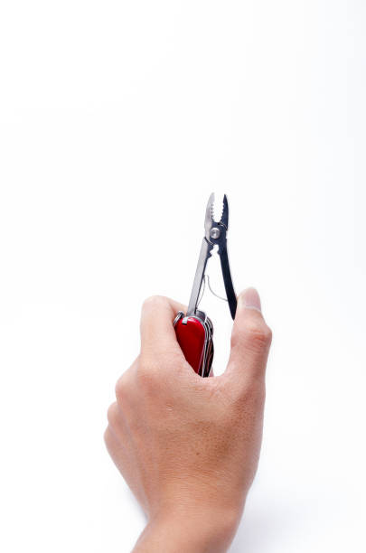 赤ナイフマルチツール、白い背景に隔離 - penknife swiss culture work tool switzerland ストックフォトと画像