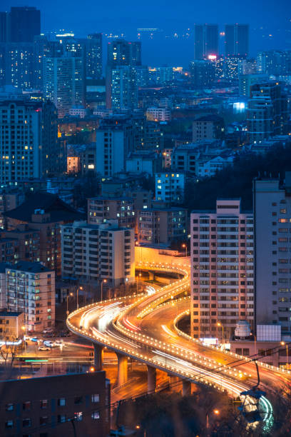 istock High Angle View Of Cityscape Lit Up At Night 670677394