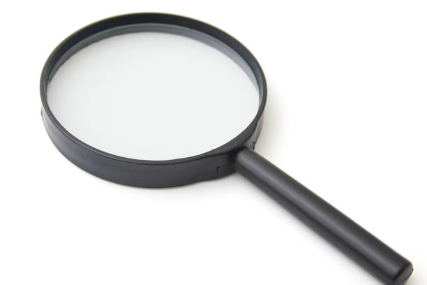 istock the magnifying glass on white background 670677470