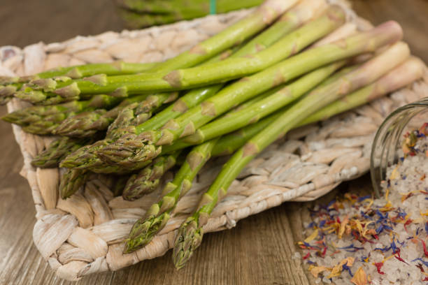 Green asparagus Green asparagus in a basket asparagus organic dinner close to stock pictures, royalty-free photos & images