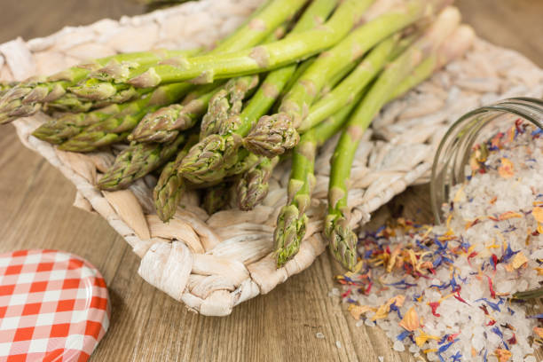 Green asparagus Green asparagus in a basket asparagus organic dinner close to stock pictures, royalty-free photos & images