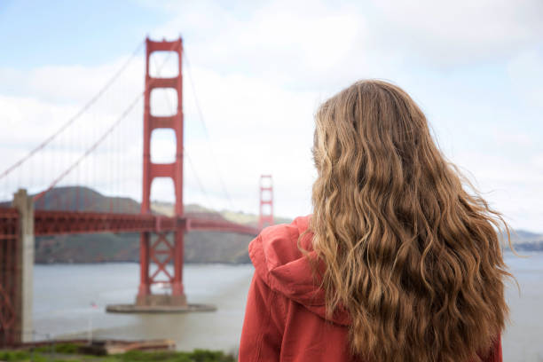 istock A girl by the Golden Gate Bridge 670678392