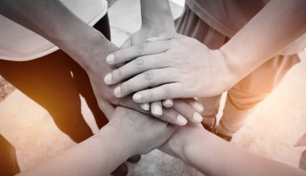 istock Hands were a collaboration concept of teamwork and bokeh background 670686284