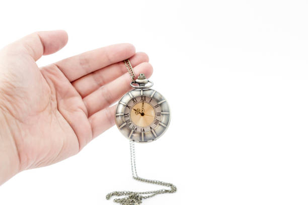istock Old pocket watch in hand 670693600