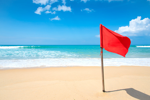 Warning sign for swimmers on the Gunga beach on the southern coast of the state of Alagoas in northeastern Brazil