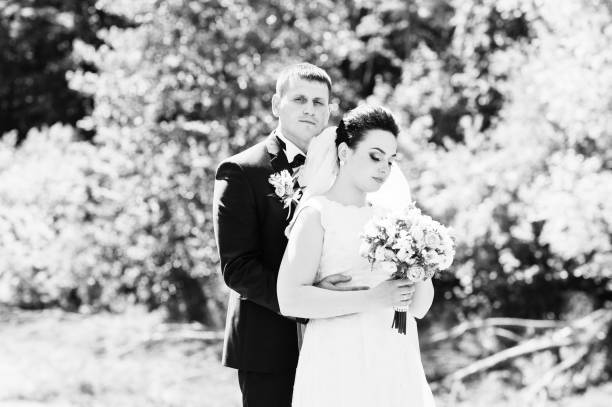 istock Gorgeus wedding couple on green sunny forest 670696544