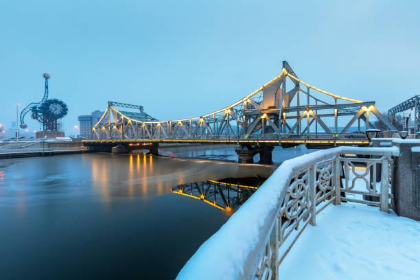 istock River And Modern Buildings Against Sky at dusk 670702160