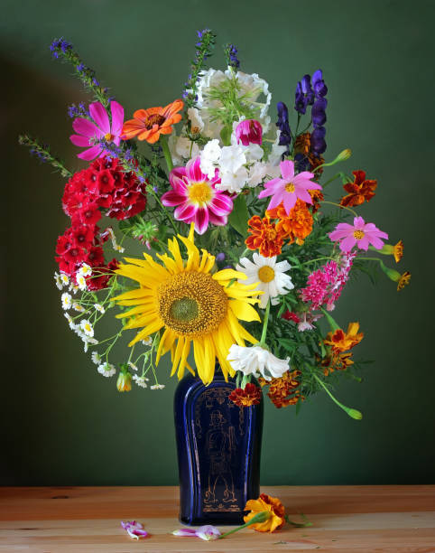 istock Still life with a bouquet  on a green background. 670705644