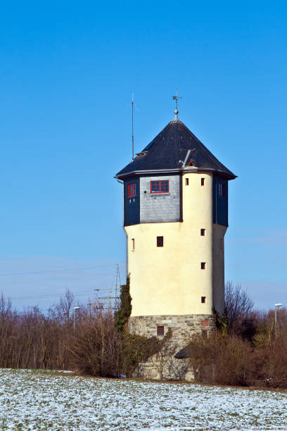 istock water tower in beautiful landscape with blue sky 670705740