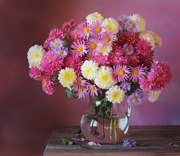 istock Still life with autumn flowers. Chrysanthemums. 670708334