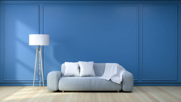istock Minimalist  interior design,light gray sofa with white lamp on blueframe wall and hardwood flooring , 3d render 670709918