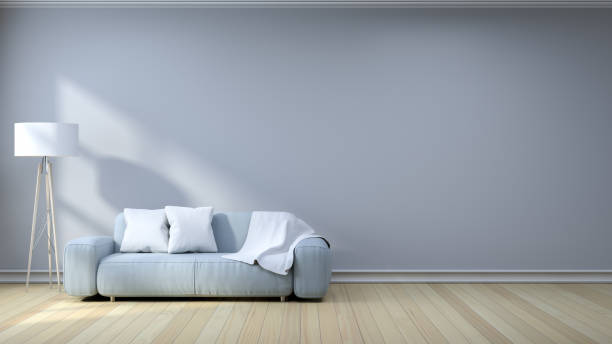 istock Minimalist  interior design,light gray sofa with lamp on gray wall and hardwood flooring , 3d render 670710184