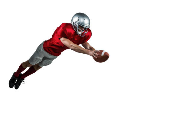 istock American football player scoring a touchdown 670716448