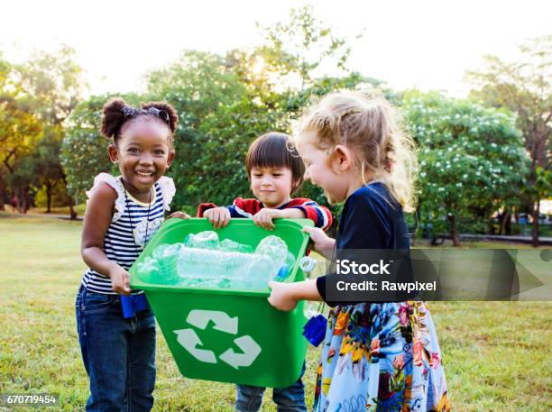 Group Of Kids School Volunteer Charity Environment Stock Photo - Download Image Now - Recycling, Child, Sustainable Lifestyle