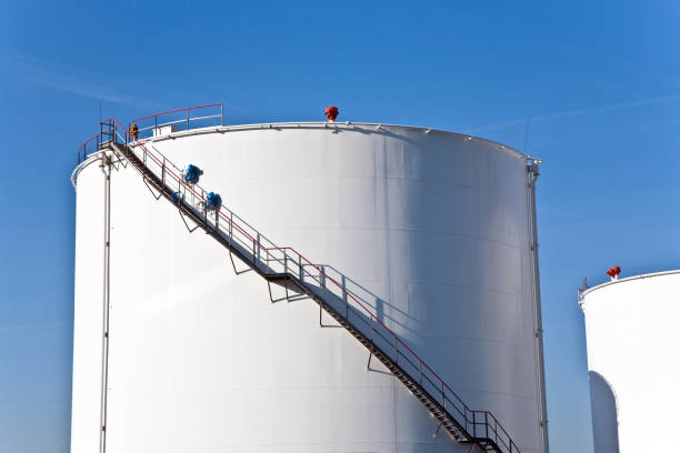 istock white tanks in tank farm with blue sky 670719648