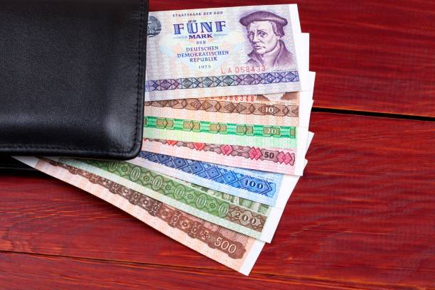 istock Old German money in the black wallet 670720612