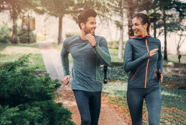istock Friends jogging in the park 670724094