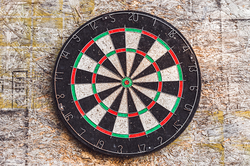Target dart on an industrial cement flat background