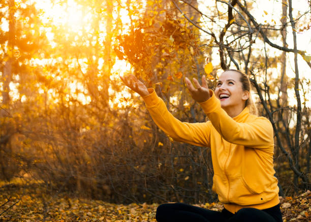 istock Happy woman outdoor in fprest 670737096