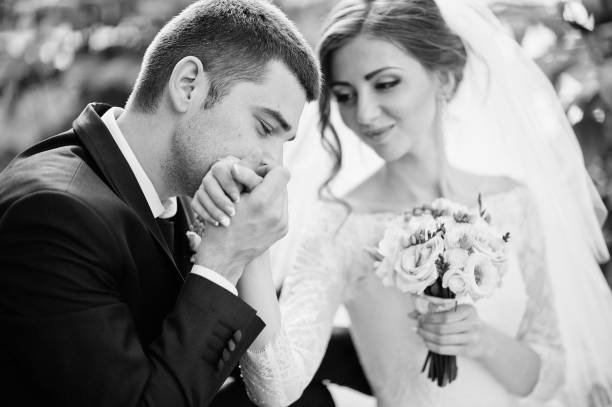 istock Groom kiss hand bride 670740744