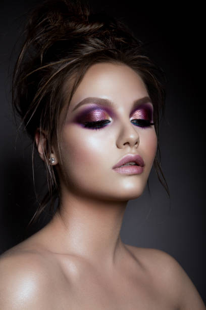 istock Beautiful woman with professional make up 670741234