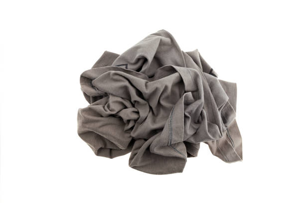 istock pile dirty clothe isolated on white background. 670751990