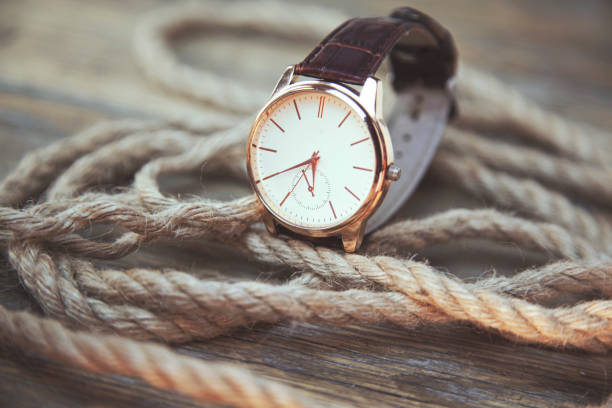 istock elegant  watch on a textured vintage background 670752726