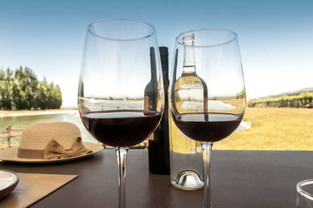 istock Glasses and bottle of red wine 670755196