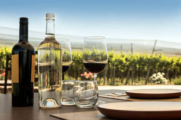 istock Glasses and bottle of red wine 670755526