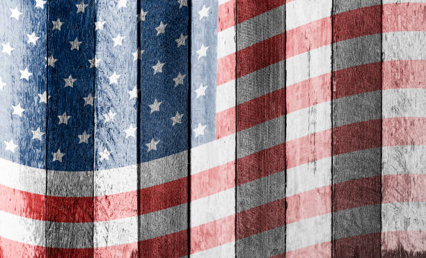 istock American flag on old wood background 670755858