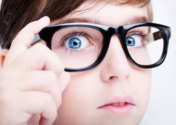 istock boy wearing eyeglasses 670766388