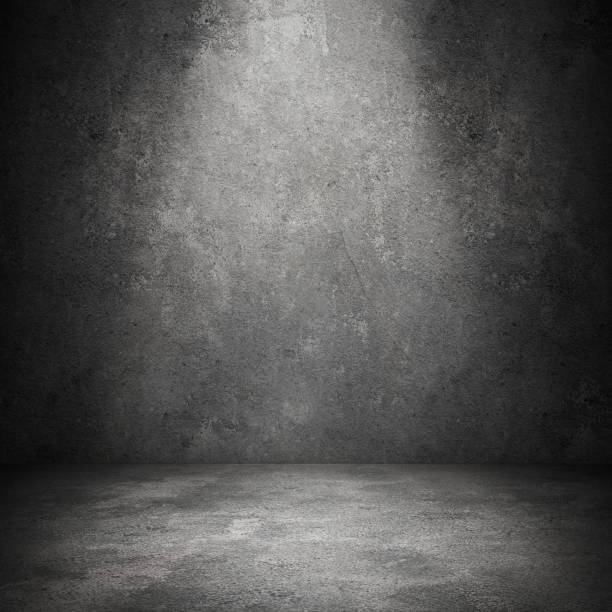 istock Grungy concrete wall and stone floor room 670768374