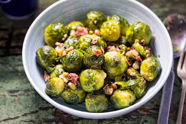 Roasted brussel sprouts with bacon stock photo
