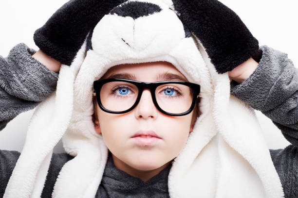 istock Handsome boy is wearing eyeglasses and panda hat. 670771866