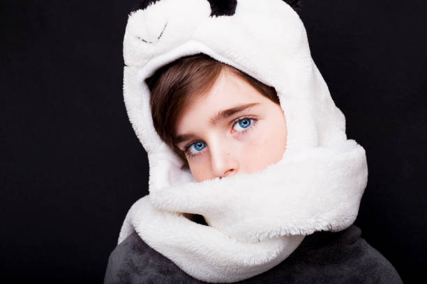 istock Portrait of a handsome boy in panda hat 670776236