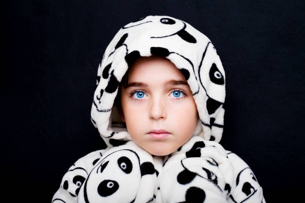 istock Portrait of a handsome boy in bathrobe Panda 670776292