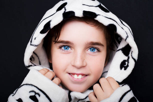 istock Portrait of a handsome boy in bathrobe Panda 670776350