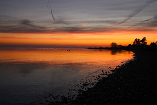 istock Heaven's beautiful colors reflecting in the sea 670776506