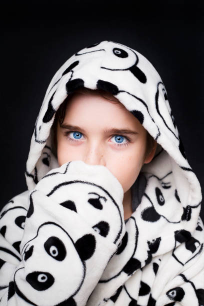 istock Portrait of a handsome boy in bathrobe Panda 670776544