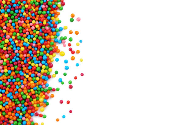 istock Colorful sprinkles on a white background 670777258
