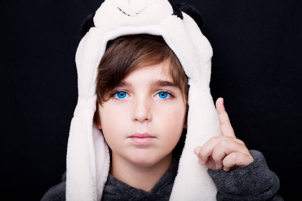 Portrait of a handsome boy in panda hat
