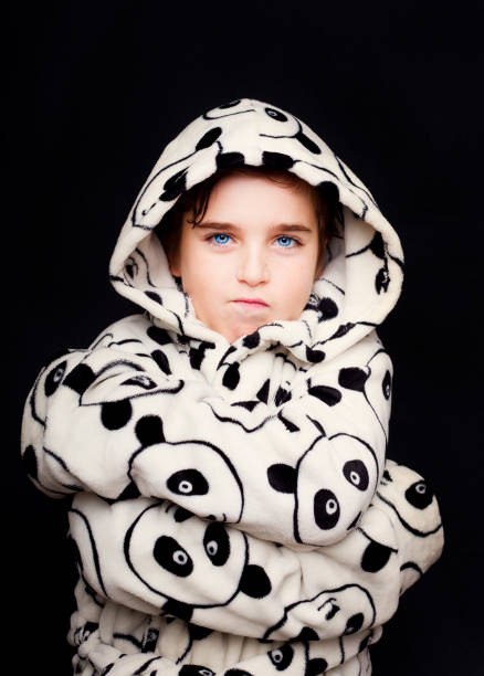istock Portrait of a handsome boy in bathrobe Panda 670777528