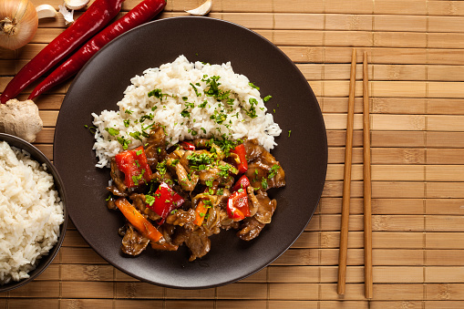 Chinese sticky pork sirloin roasted with a sweet and savory sauce served with boiled rice