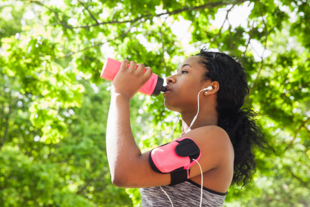 istock Fit woman taking a drink 670782566