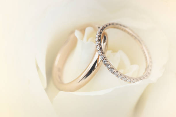 istock Soft blurred of wedding ring on a rose pastel color style background. 670782992