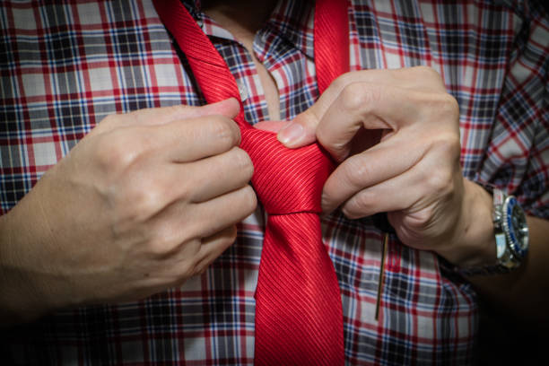 Detail of the groom's tie and boutonniere