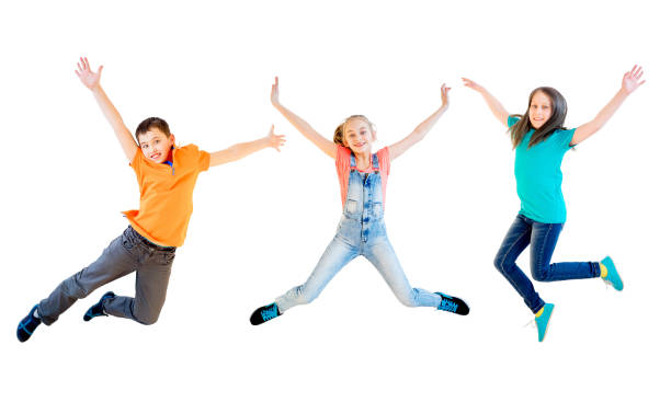 istock Happy kids jumping 670786394