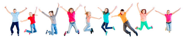 Happy kids jumping Happy kids jumping isolated on white background jumping teenager fun group of people stock pictures, royalty-free photos & images