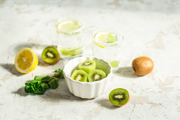 istock Sliced ​​kiwi for a drink with mint and lemon 670793404