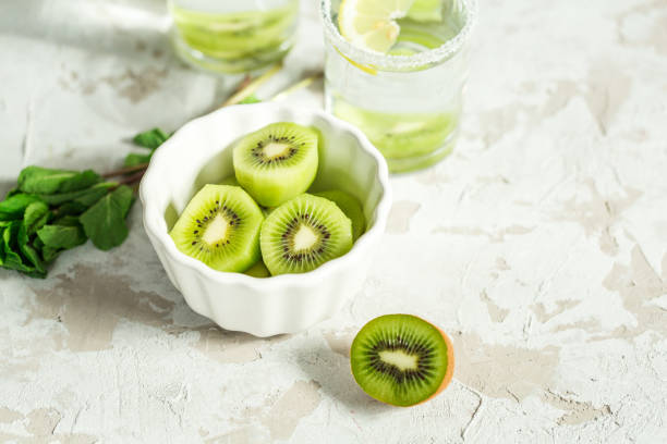 istock Sliced ​​kiwi for a drink with mint and lemon 670796490